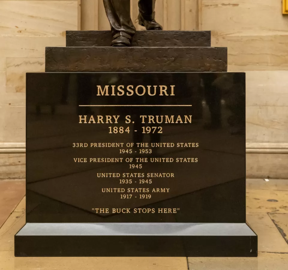 The front of the pedestal notes highlights from Truman's government service: Harry S. Truman 1884-1972 / 33rd President of the United States 1945-1953 / Vice President of the United States 1945 / United States Senator 1935-1945 / United States Army 1917-1919 / "The Buck Stops Here"