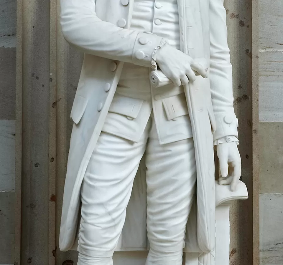 Detailed view of the hands on the Alexander Hamilton statue.