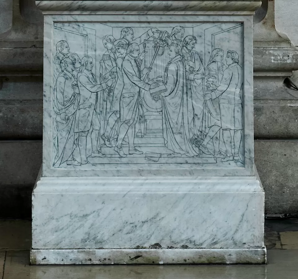 Detailed view of the pedestal on the Alexander Hamilton statue.