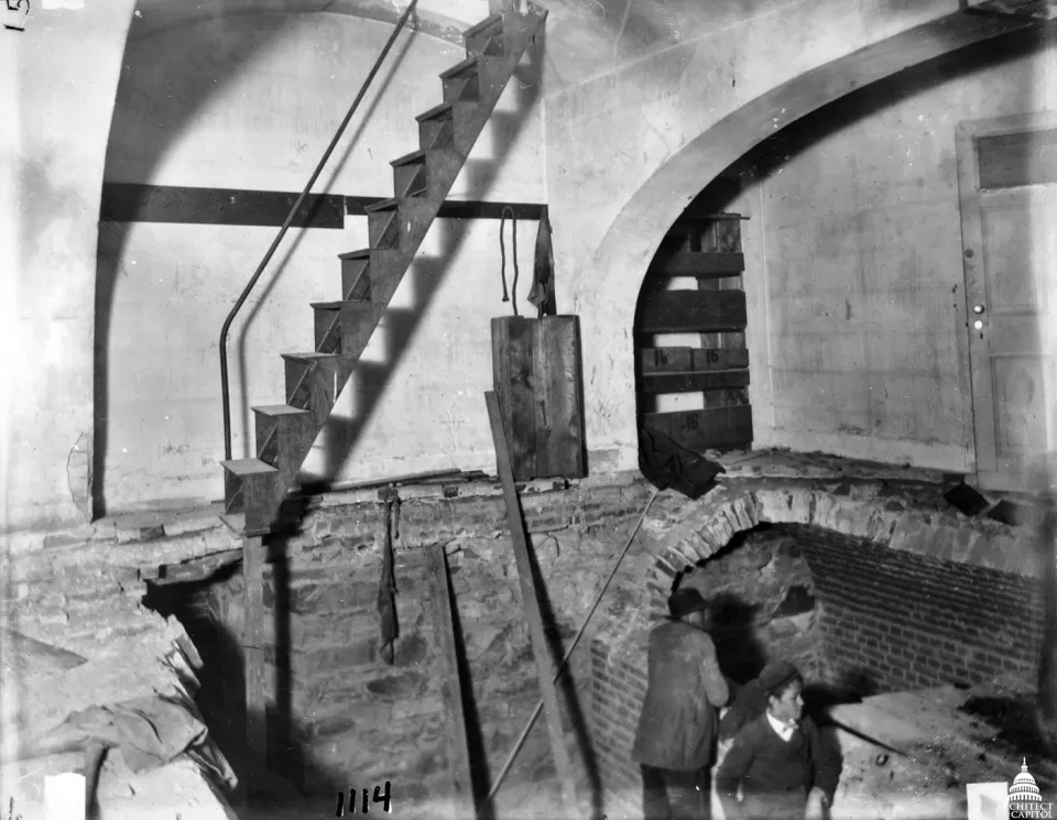 The 1898 gas explosion blew away the stone floor in the small Senate rotunda, exposing the cellar where a fire raged until the AOC's chief electrician crawled through the debris to turn off the gas.