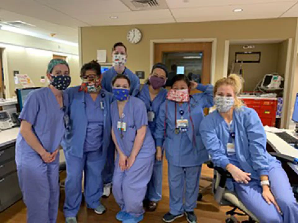 Nurses wearing masks sewn by a CVC employee.