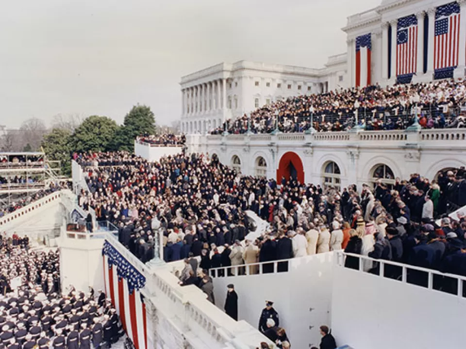 View of the presidential inauguration platform and guests at the U.S. Capitol.