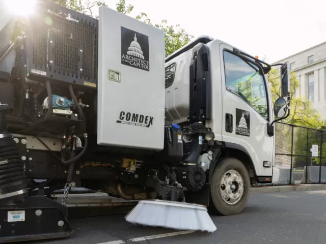 An Architect of the Capitol street sweeper cleans up in Washington, D.C.