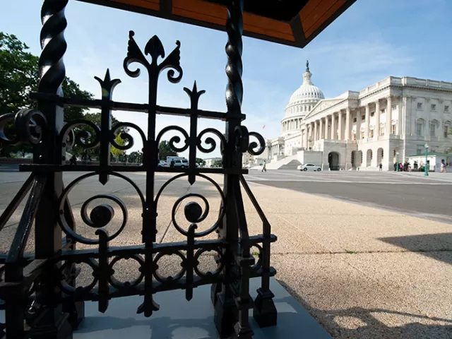 View of the U.S. Capitol's East Front from under the north trolley stop trellis.