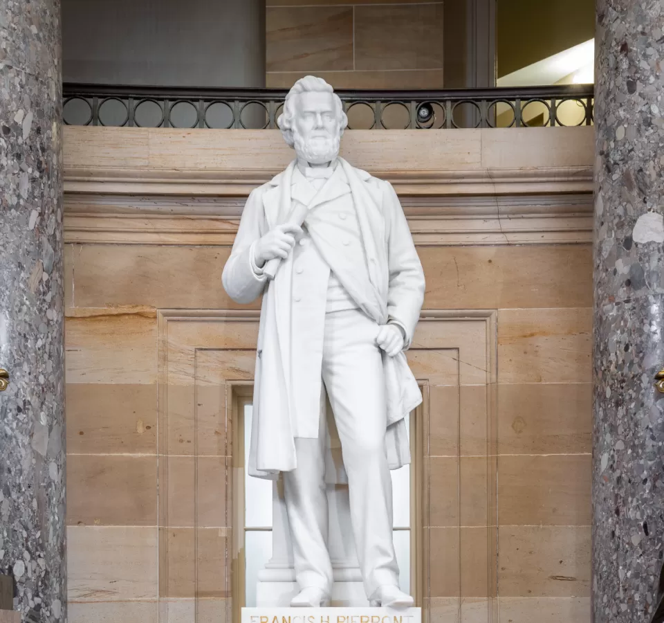 Marble statue of a person standing.