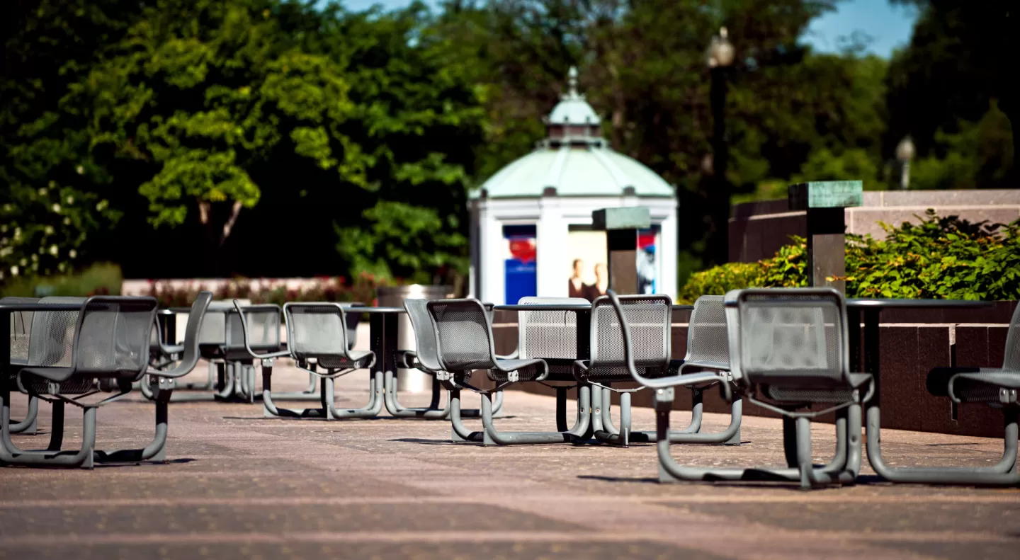 View of tables and chairs outside of the main entrance to the James Madison Building in Washington, D.C.
