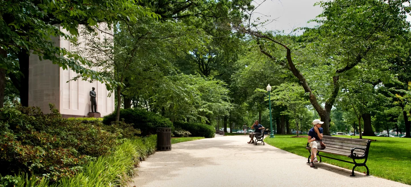 Benches to rest can be found along the tree-lined path near the Taft Memorial.
