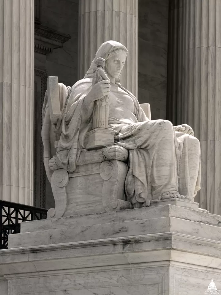 Statue of Contemplation of Justice by James Earle Fraser on the U.S. Supreme Court Building's main steps.