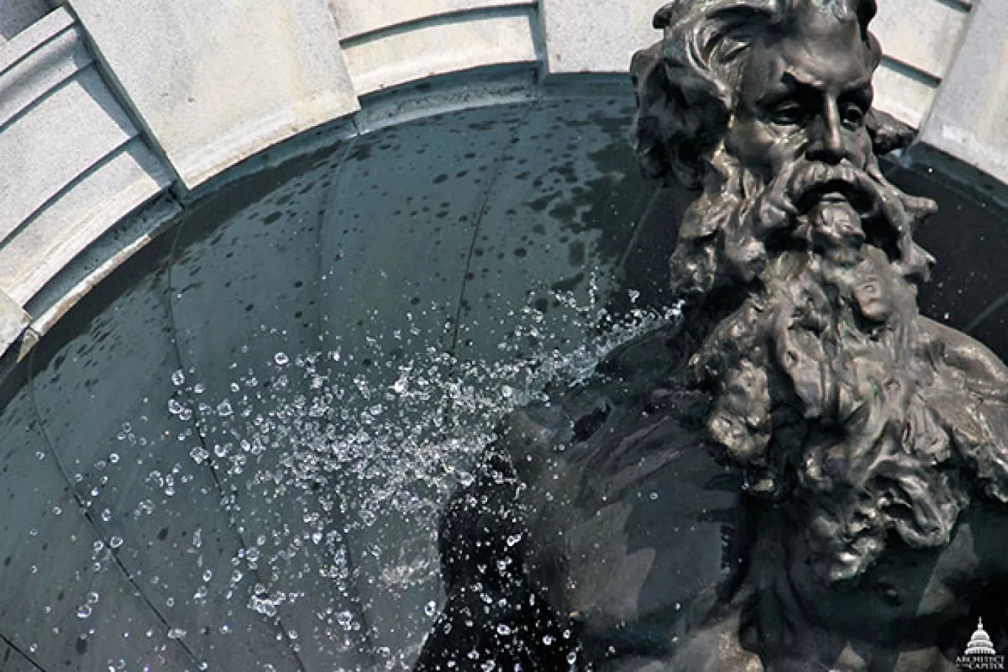 Detailed look at the Neptune sculpture element of the fountain at the Thomas Jefferson Building in Washington, D.C.