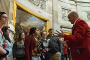 A tour with guide in the U.S. Capitol Rotunda.