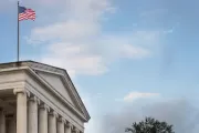 American flag waving atop of the Longworth House Office Building.