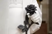 Close-up image of the black rose in Bethune's statue.