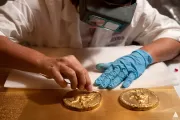 Cleaning the Magna Carta, now on display in the Capitol Crypt; detail of the two medallions depicting the seal of King John.