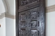 The bronze Amateis Doors on display in the House Wing of the U.S. Capitol.