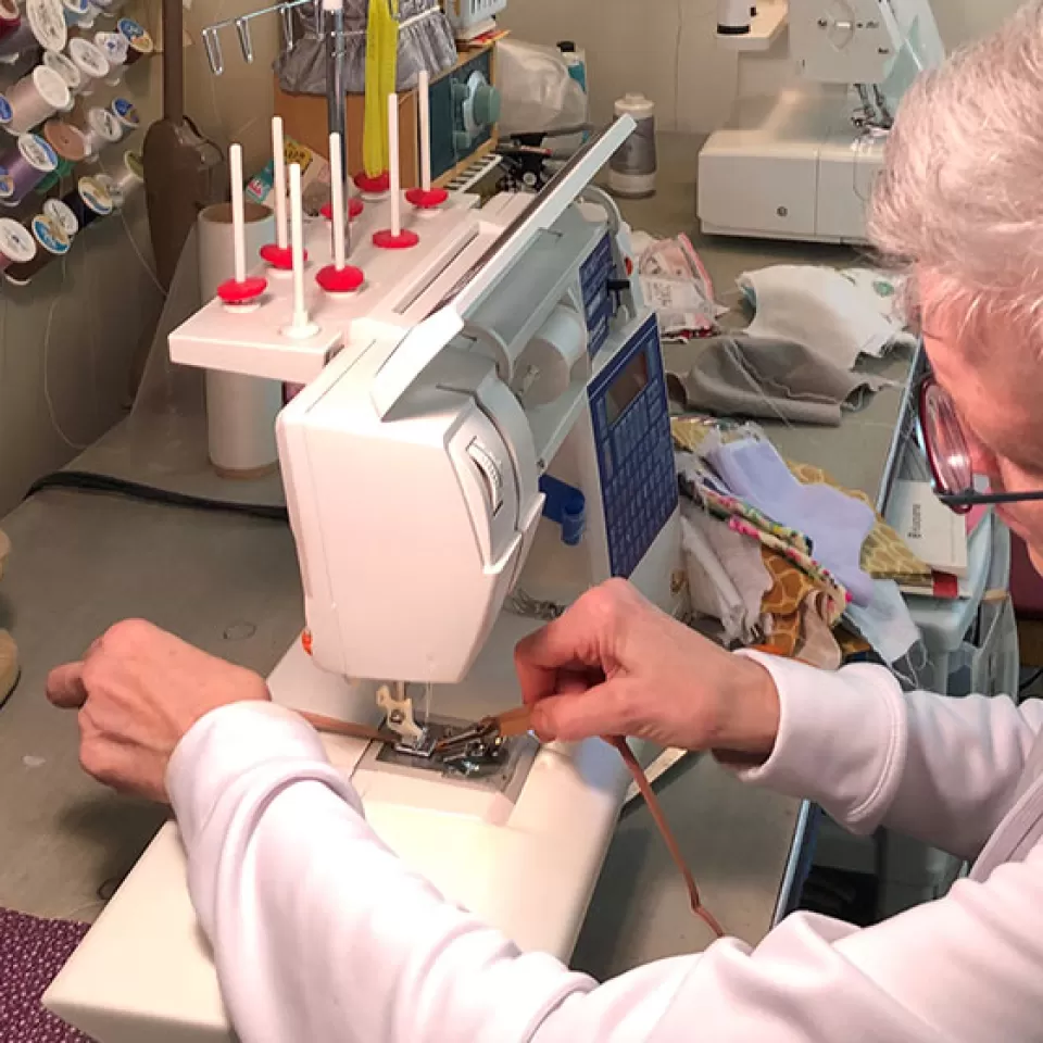 CVC employee sewing face masks during the novel coronavirus.