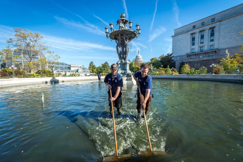 Workers cleaning Bartholdi Fountain