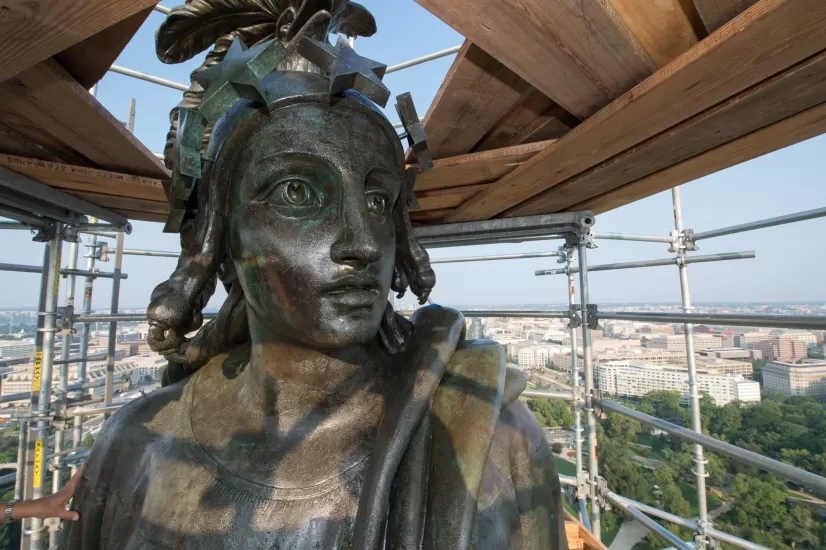 Up-close view of a statue's face.