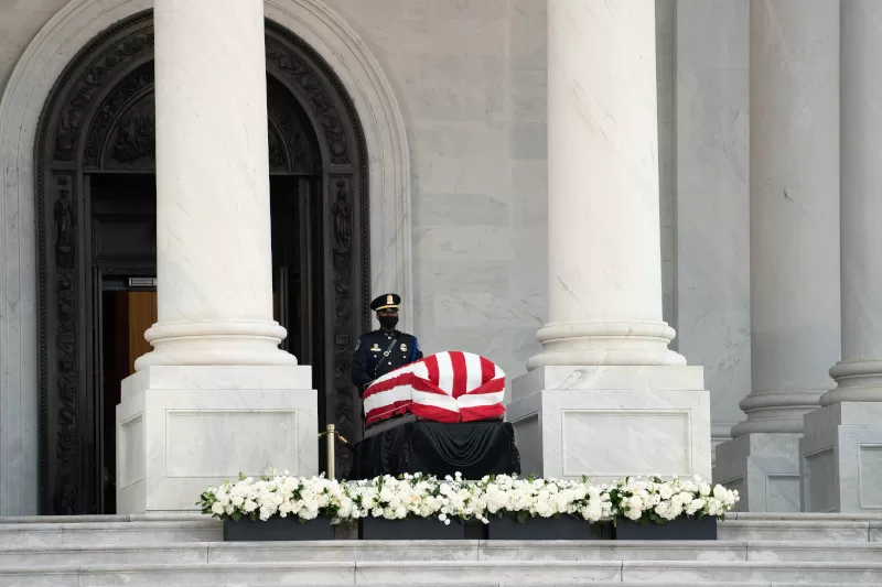 The United States Capitol Police stands guard over Representative Lewis’ casket on the East Front Portico of the U.S. Capitol.