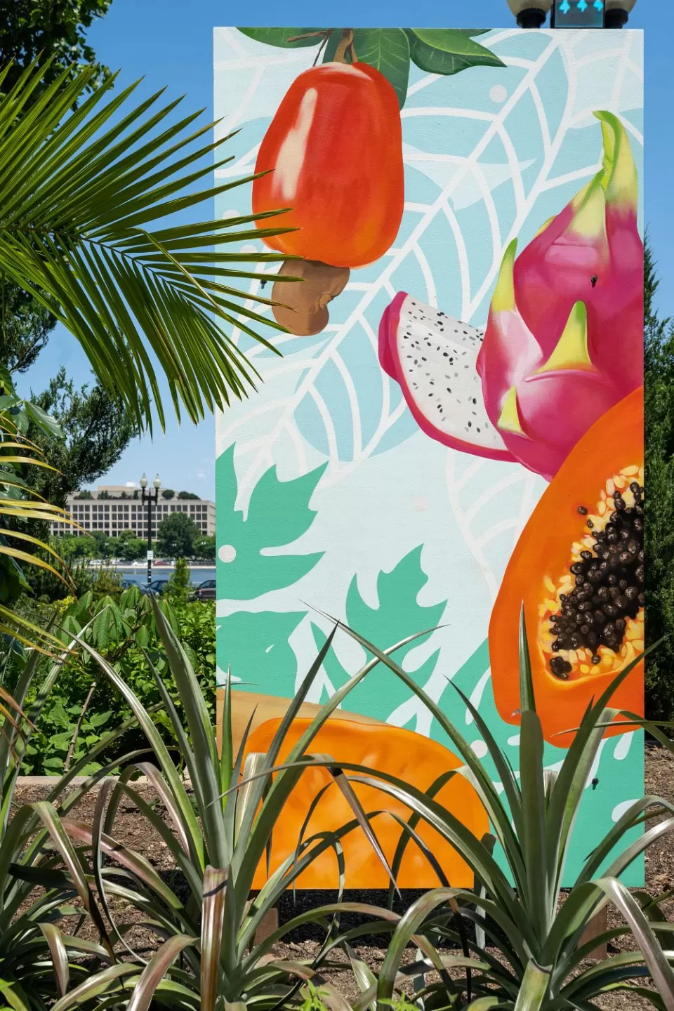 One of the 19 custom murals showcasing the origins of crops that were created for an outdoor portion of the exhibit.