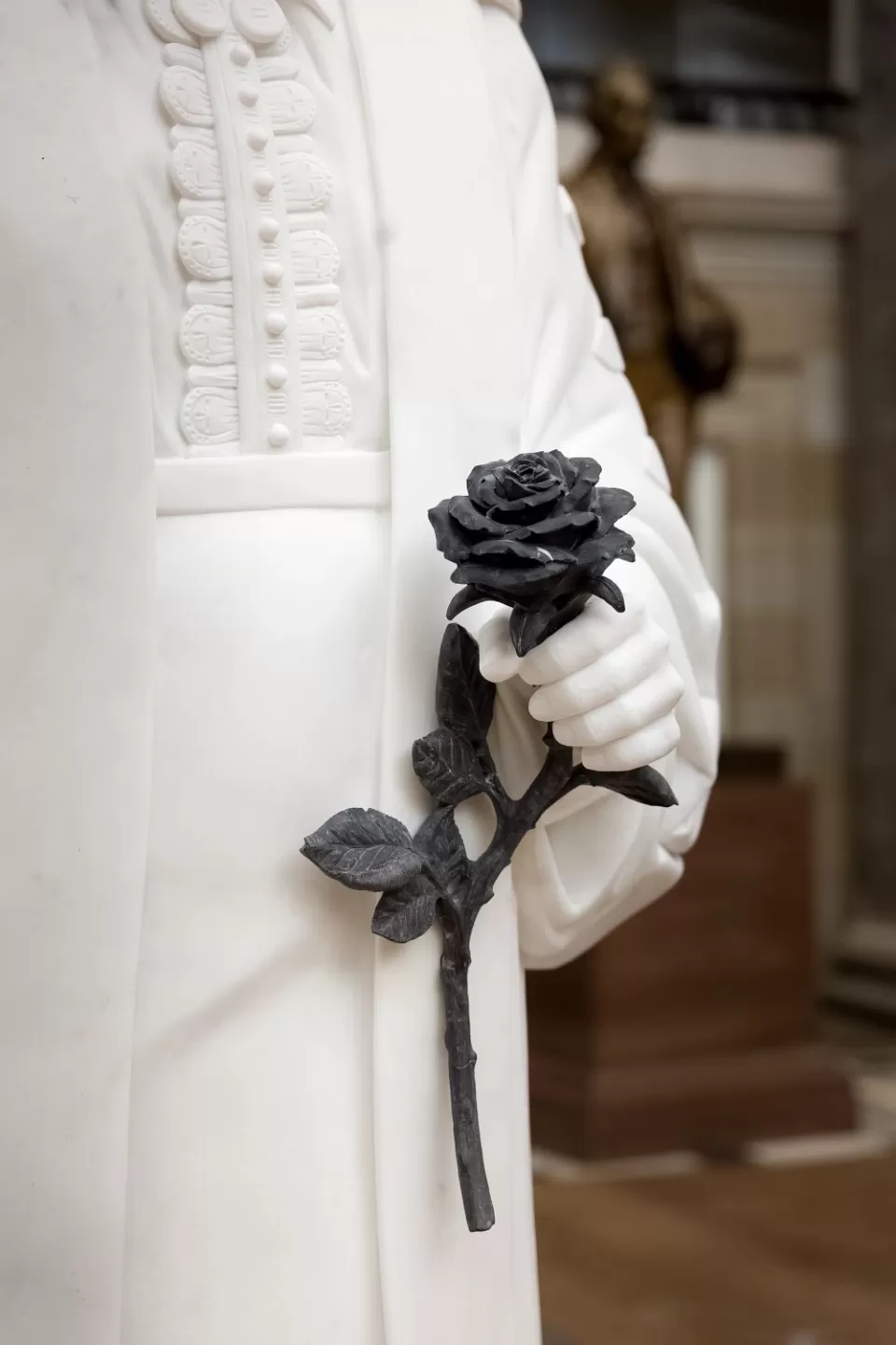 Close-up image of the black rose in Bethune's statue.