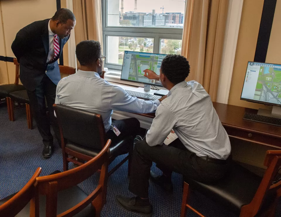 Assistant Superintendent Barron Dill assists congressional staff with selecting a suite.