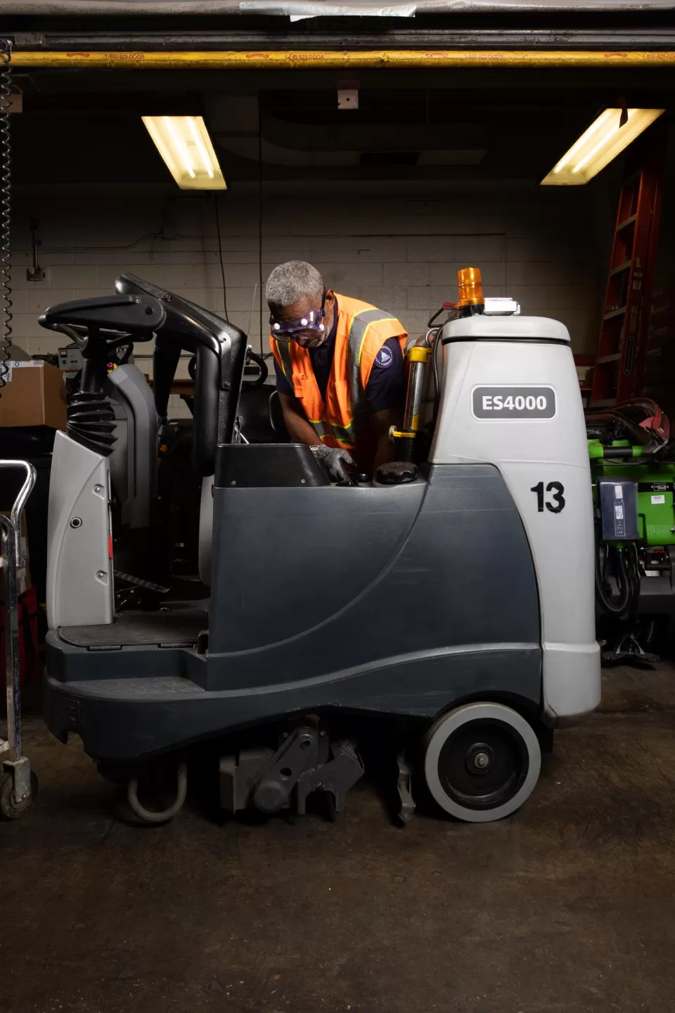 AOC's Kenneth Vereen examines one of the Advance ES4000 machines.