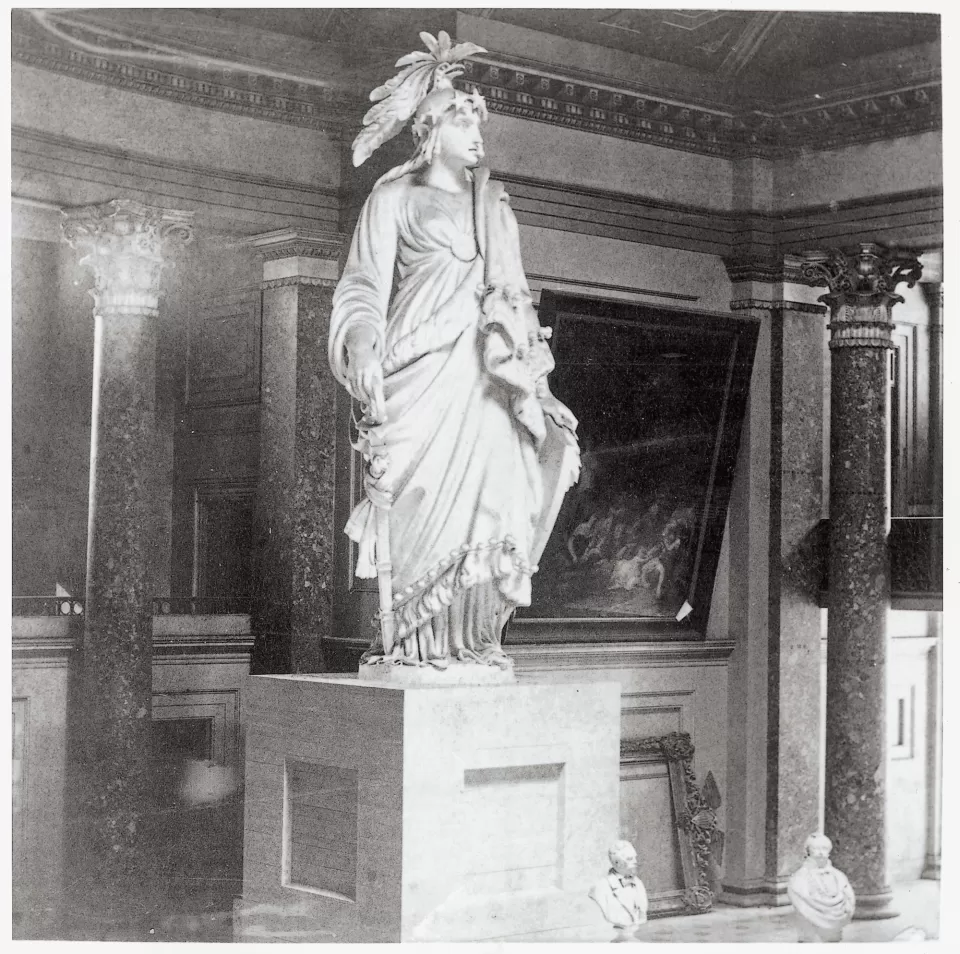 Statue of a person standing.