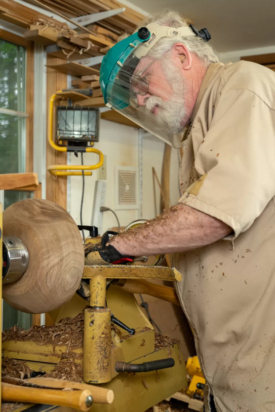 Person working with wood.