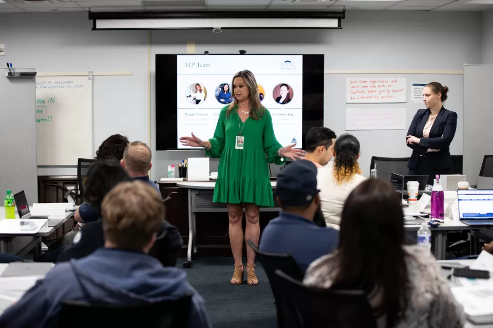 A person giving a presentation to a group.