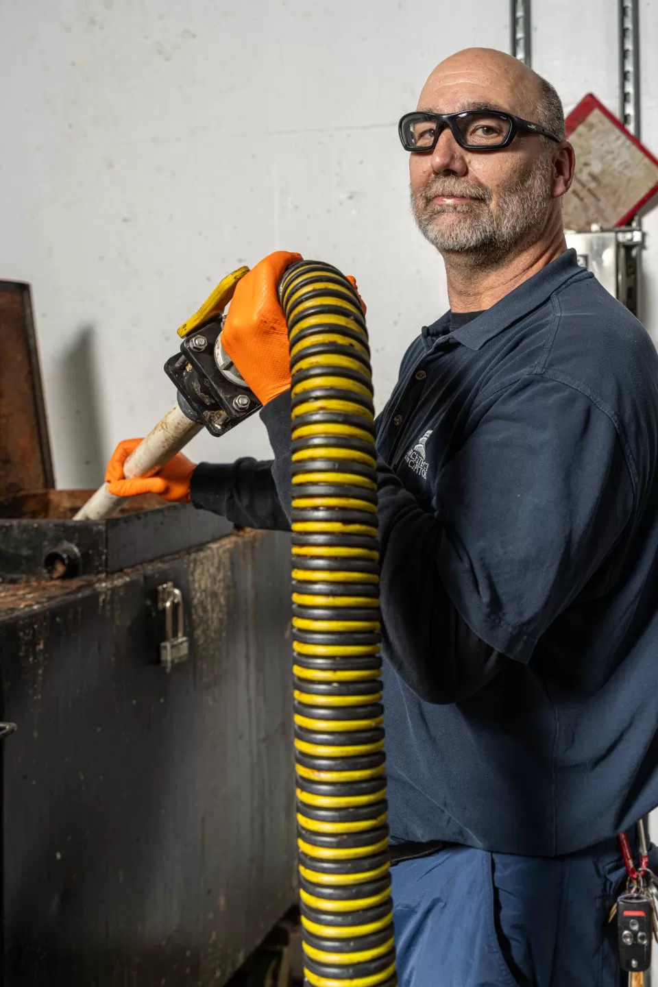 Person holding equipment.