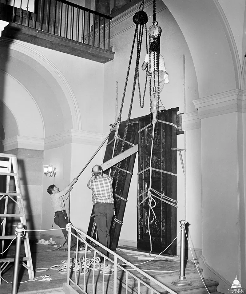 AOC employees, seen here in 1972, installing the Amateis Doors in the U.S. Capitol.