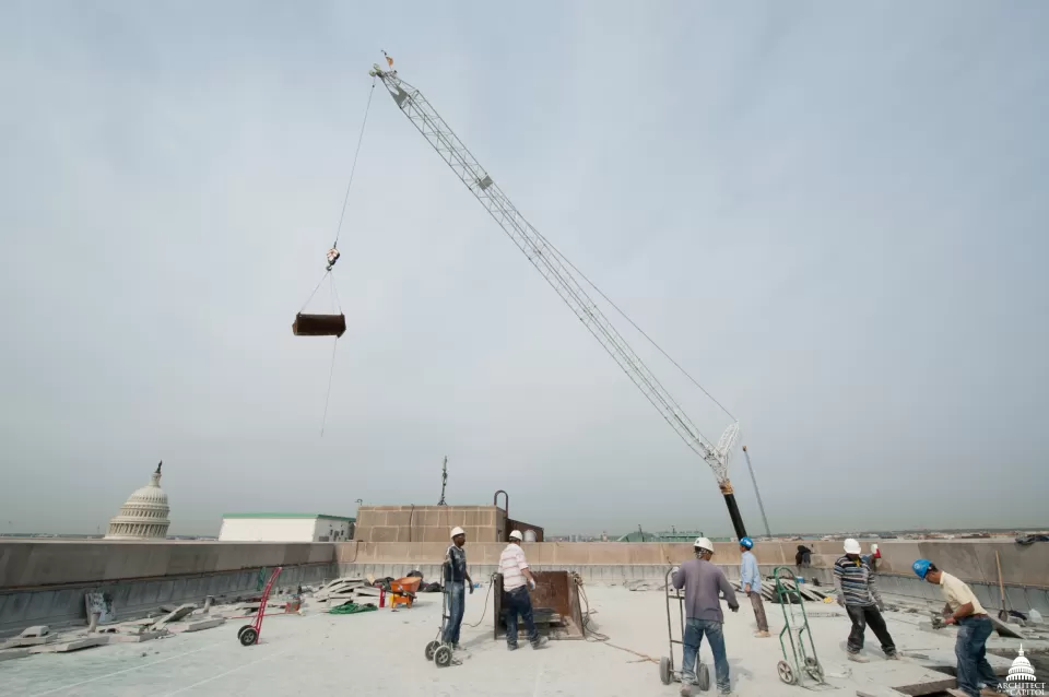 Removal of the lightweight concrete from the Dirksen Building roof.