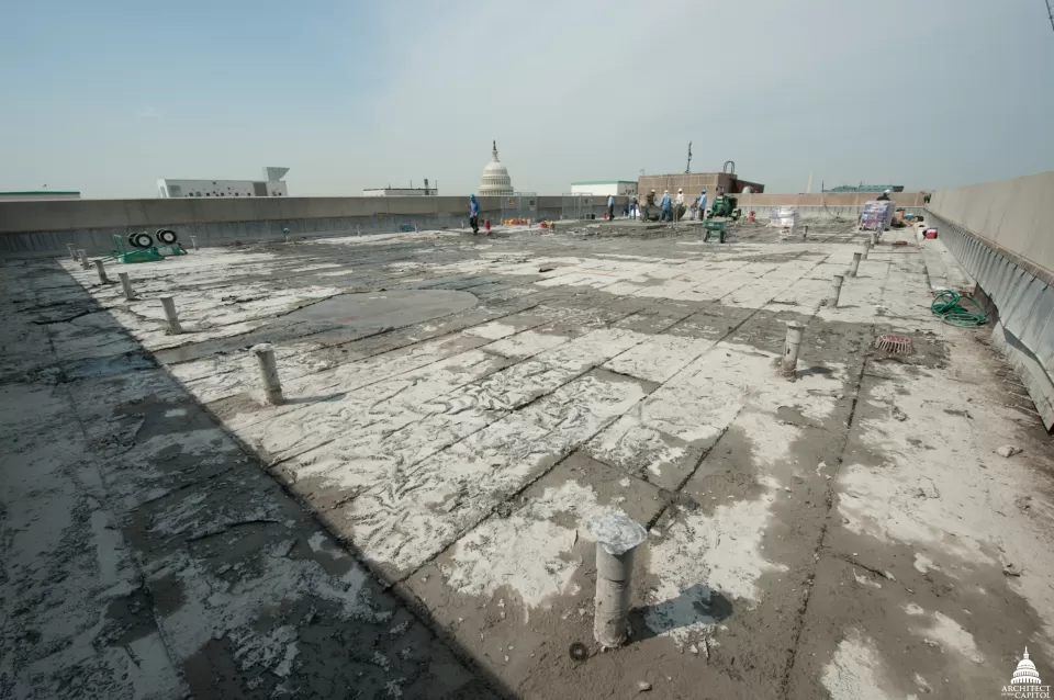 The old insulation and waterproofing visible on the Dirksen Building roof after the concrete was removed.