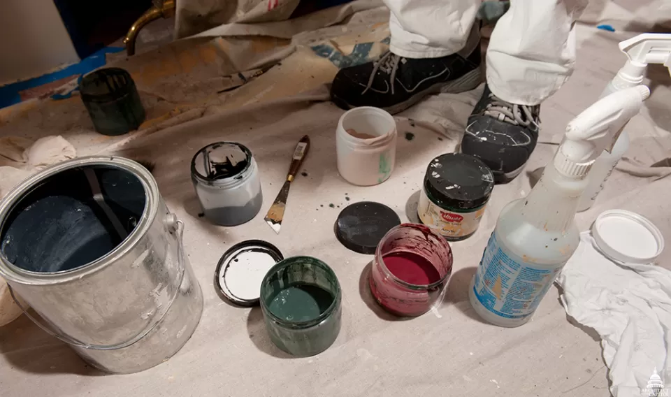 An AOC decorative painter can create a "marble" fireplace from wood through skilled application of the right colors and design.