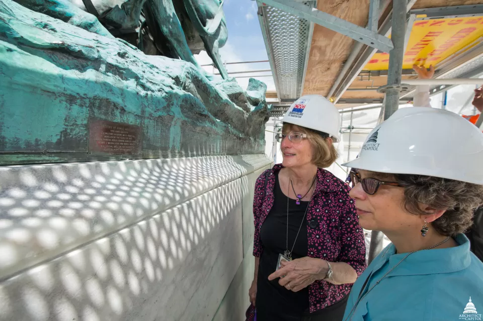 Wolanin and Cohen examine the Grant Memorial.