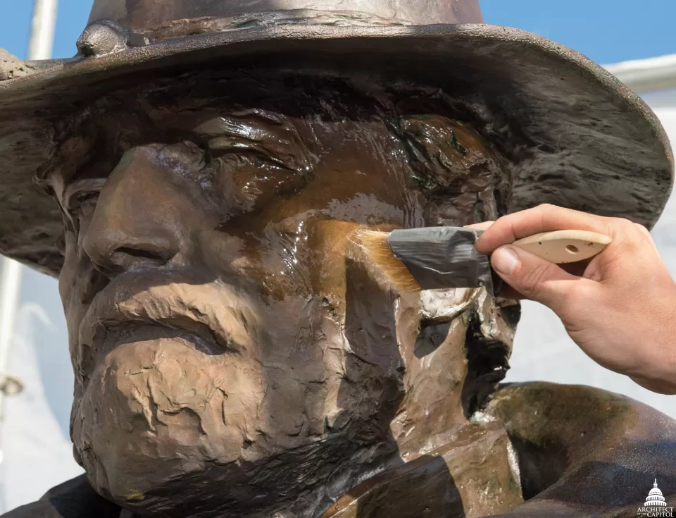 General Grant receiving the first layer of lacquer.