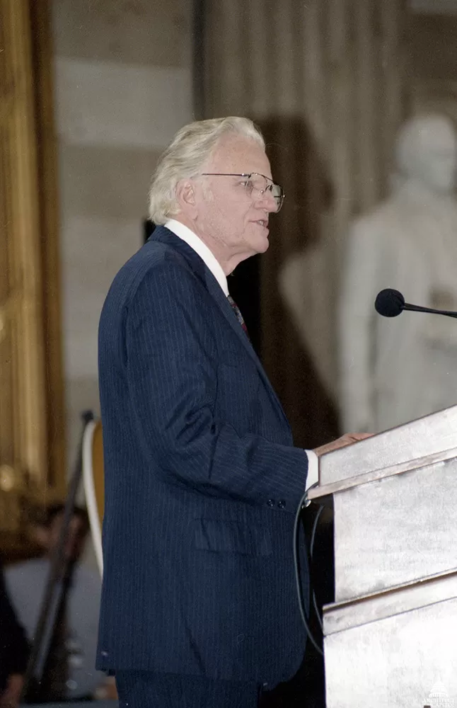 The Reverend Billy Graham giving remarks after he and his wife Ruth Graham were presented the Congressional Gold Medal in 1996.