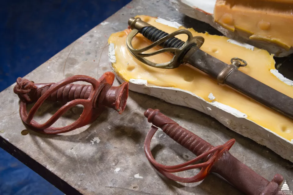 Grant Memorial bronze sword and mold at the foundry.