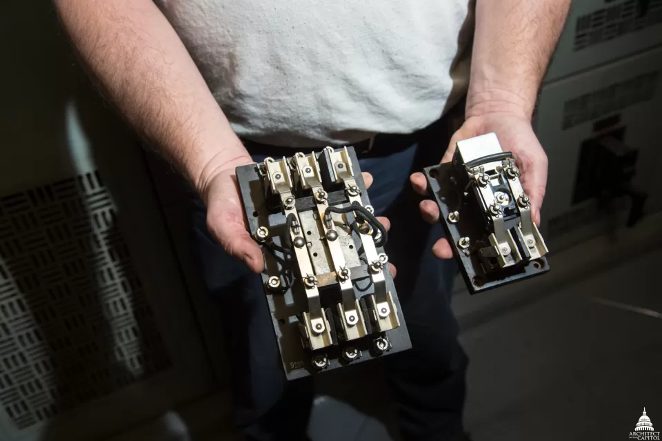 Two relay switches are used to open and close the doors on the Russell Building subway cars. In the subway to the Dirksen and Hart Buildings, the same task is performed by programmable logic controllers, rather than physical switches.
