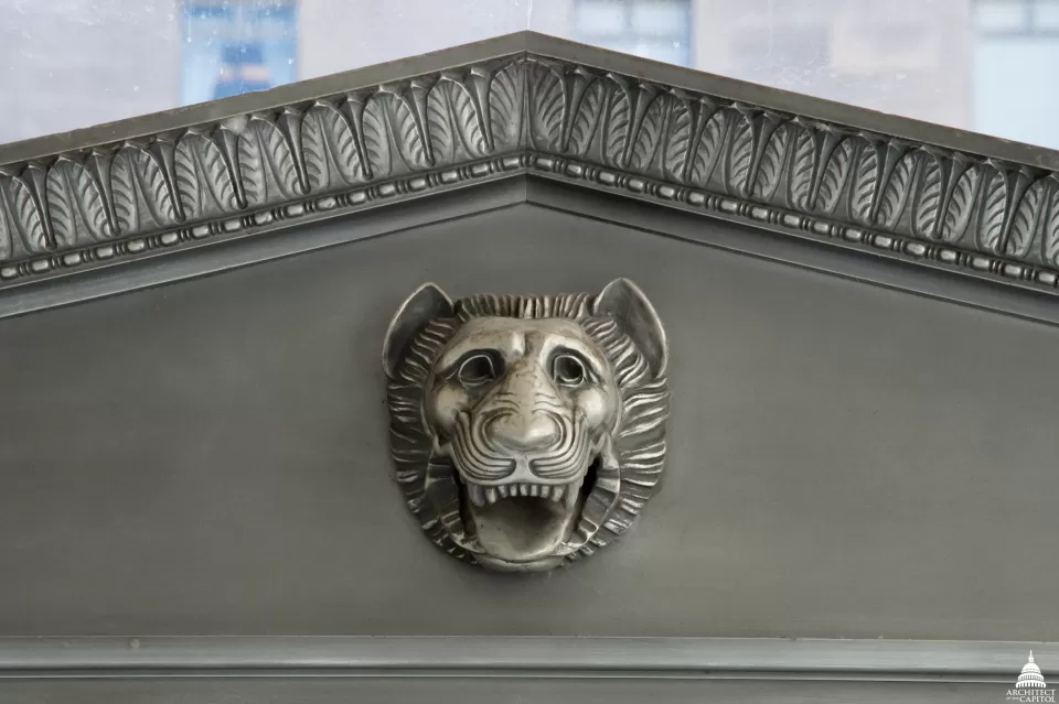 Lion head ornamentation above the door leading from the Rayburn Building foyer to its courtyard.