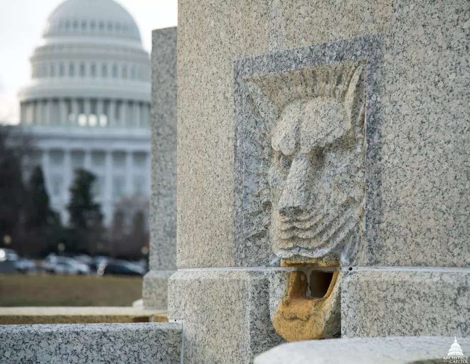 One of the lion-head spouts on the Senate Fountain.