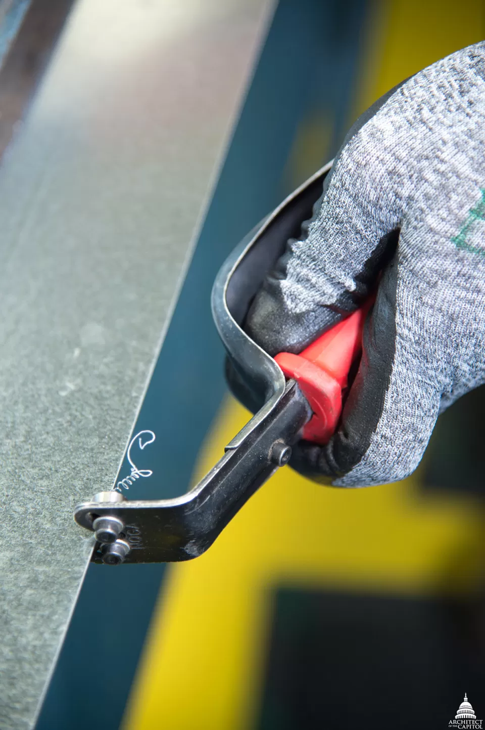 The deburring tool used to remove sharp edges from sheet metal.