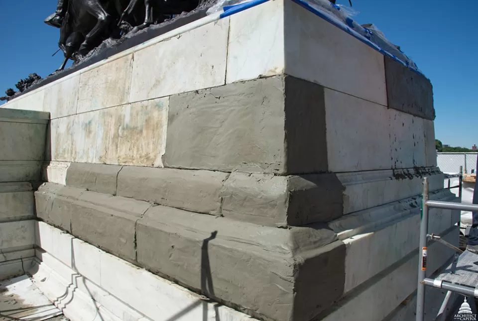 Stone being restored on the Grant Memorial.