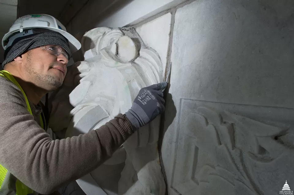 Restoration work on the Cannon Building's exterior facade.