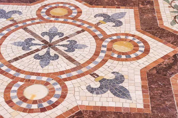 An example of inlaid encaustic tiles, or Minton tiles, featuring fleur de lis used in the flooring of the U.S. Capitol.