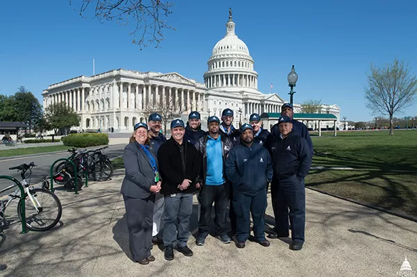  Capitol Building staff proudly sporting their bump caps.