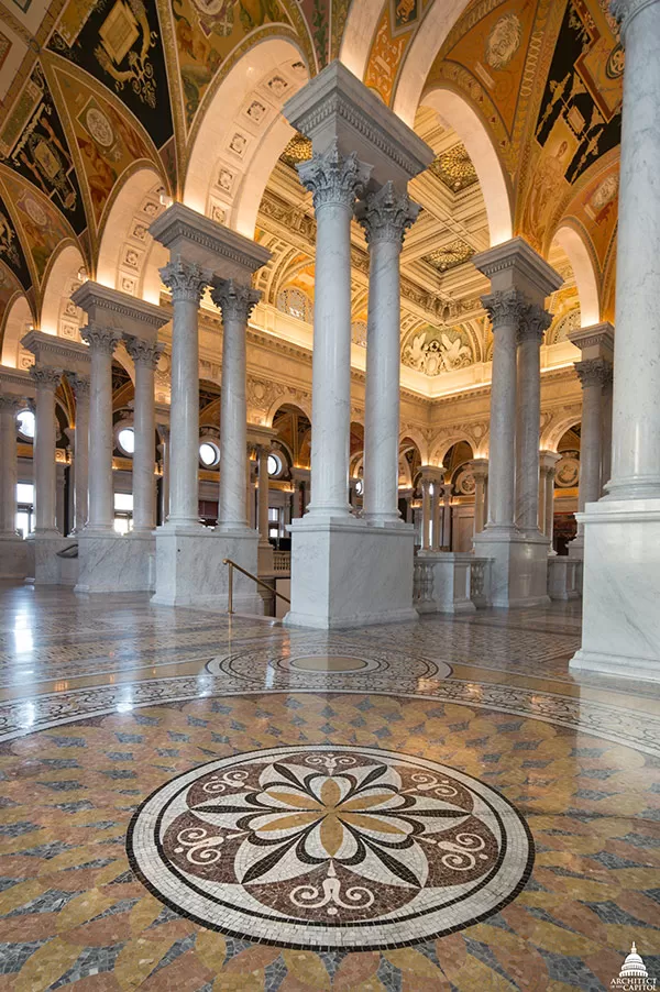Mosaic tiled floor, Corinthian columns and painted archways of the Great Hall in the Library of Congress Thomas Jefferson Building.