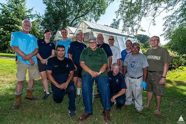 Joe Francis (seated) with USBG employees and helpers on moving day.