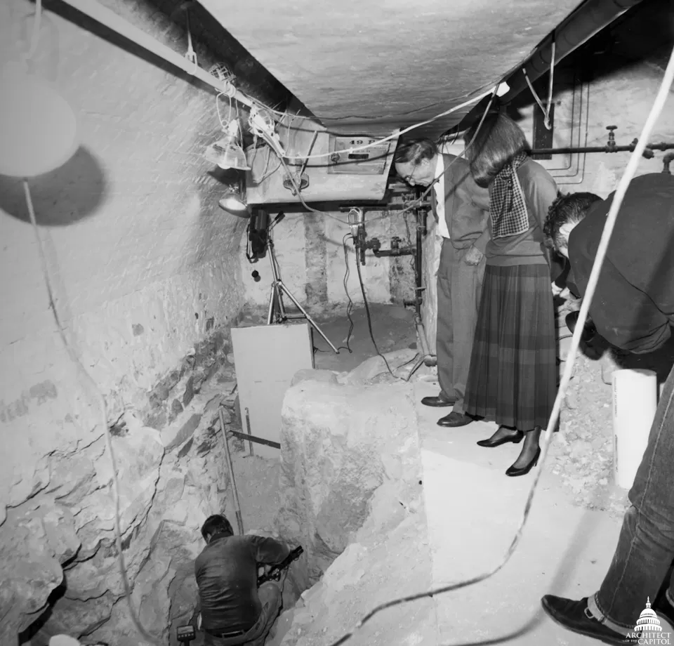 Ninth Architect of the Capitol George White and Senate Sergeant at Arms Martha Pope look on during a search for the Capitol's first cornerstone in 1991.