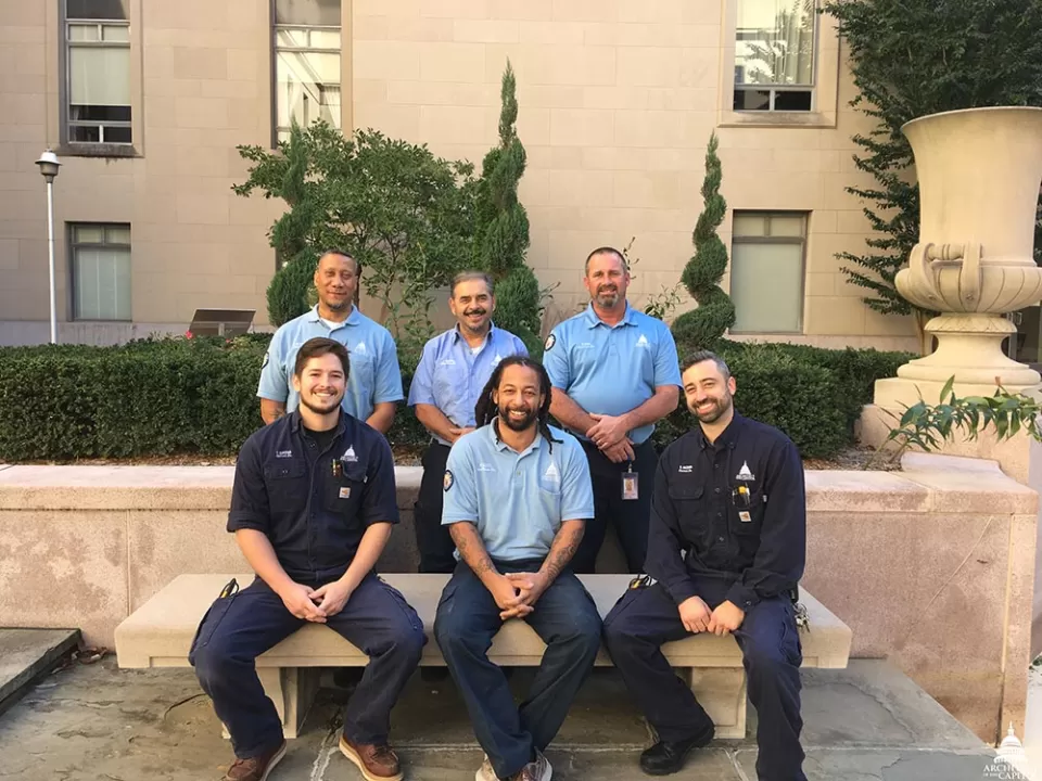 Group photo of AOC House Office Building electricians and masons who worked on project